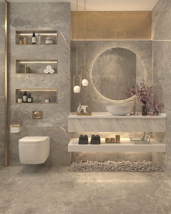 a modern bathroom with marble walls and flooring