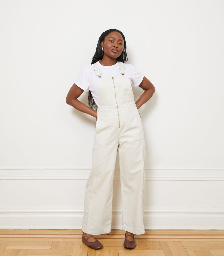 Zip up overalls with a relaxed barrel leg, adjustable straps and tons of details. 100% Cotton. Machine washable. Made in Los Angeles. XXS - Waist= 24”, Hips= 40”, Inseam= 28” XS - Waist= 26", Hips= 42", Inseam= 28" S - Waist= 28", Hips= 44", Inseam= 28" M - Waist= 30", Hips= 46", Inseam= 28" L - Waist= 32", Hips= 48", Inseam= 28" XL - Waist= 34”, Hips= 50” Inseam= 28” 1X - Waist= 36”, Hips= 52” Inseam= 28” 2X - Waist= 38”, Hips= 54” Inseam= 28” 3X - Waist= 40”, Hips= 56” Inseam= 28” 4X - Waist= Black Tank Dress, Black Aviators, Vintage Inspired Outfits, Neon Purple, Long Jumpsuits, Boyfriend Tee, Ruched Dress, Black Stretch, Designer Outfits Woman