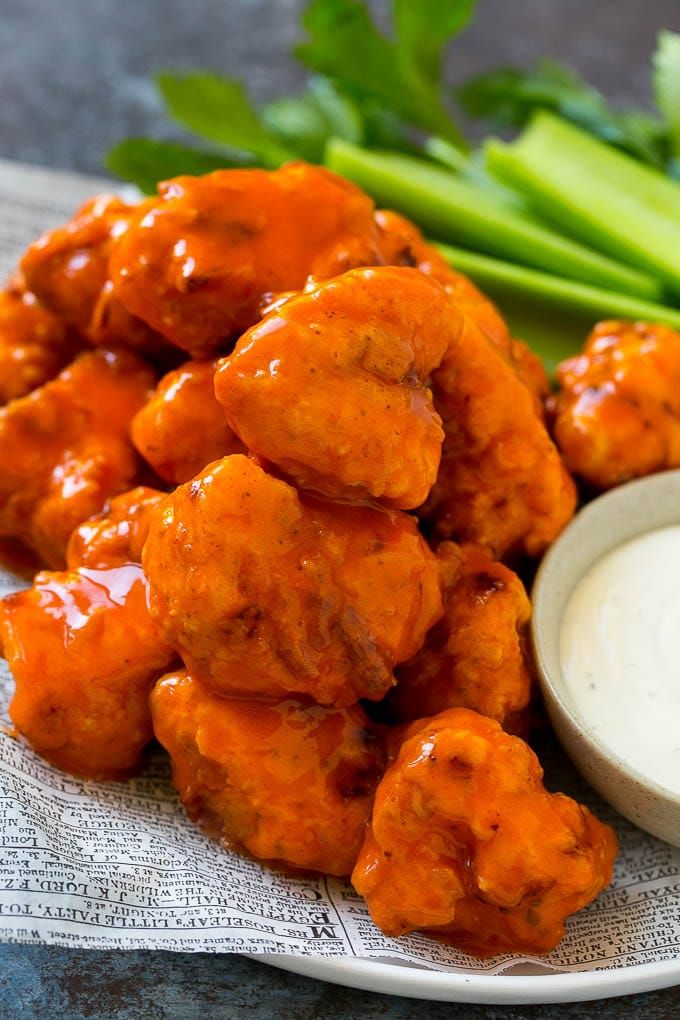 buffalo chicken nuggets with ranch dip and celery on the side for dipping