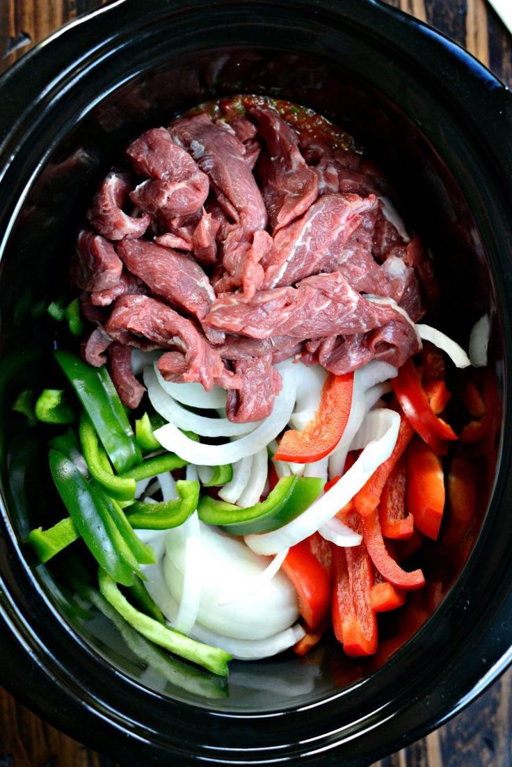 the food is prepared and ready to be cooked in the crock pot for dinner