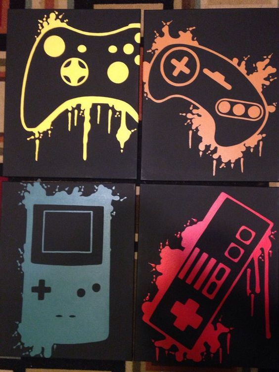 four different colored video game controllers painted on canvases