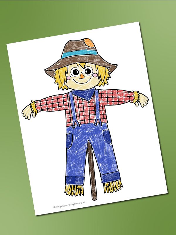 a drawing of a scarecrow wearing overalls and a hat