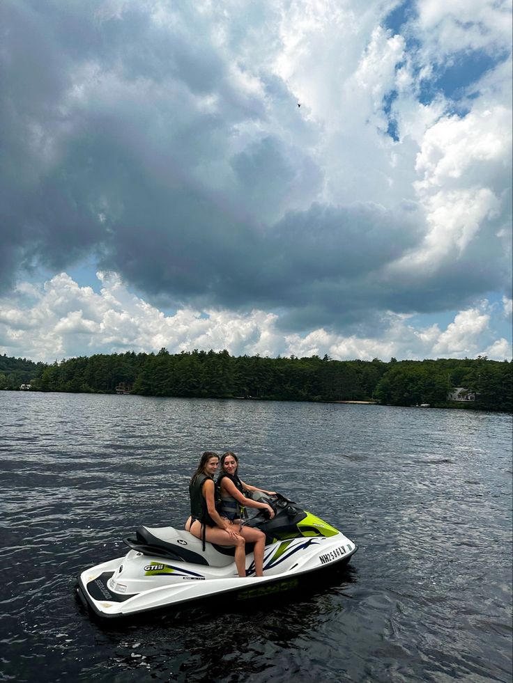 two people on a jet ski in the water