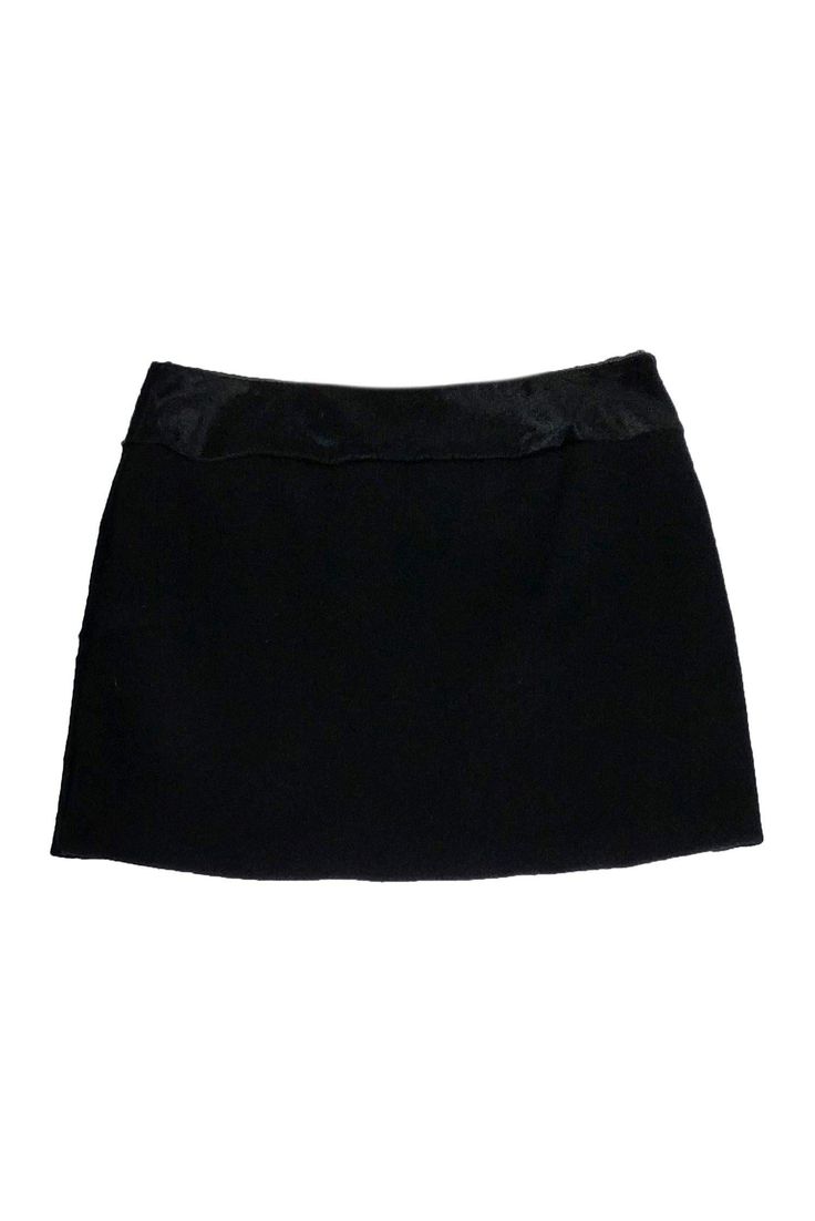 Made out of calf hair, this mini skirt is a modern and daring touch to any party look. You can take it to a new level by adding a sequin top and chic pumps. You will be party ready in this little number. Size 12 Calf fur Wrap style Above knee Lined Waist 32" Hips 41" Total length 16" Evening Mini Skort With Lined Skirt, Lined Mini Skort For Evening, Elegant Stretch Mini Skirt For Going Out, Evening Mini Skort, Sleek Mini Bottoms For Party, Fitted Mini Skirt For Cocktail, Short Evening Skort With Lined Skirt, Glamorous Black Mini Skirt For Formal Occasions, Glamorous Fitted Mini Skirt For Formal Occasions