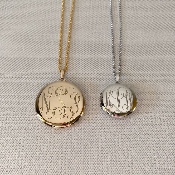 An adult-size plain polished 14K yellow gold-filled round locket on a rope chain necklace. The outer shell is solid gold pressure-bonded to an inner core of high-quality brass. Locket Dimensions: 33 mm Chain length: 31" Yellow Gold Plated Round Locket Necklace, Yellow Gold Round Locket Necklace Hallmarked, Gold Round Brass Locket Necklace, Round Brass Locket Necklace, Gold-tone Round Locket Necklace, Round Locket Necklace, Necklace Locket, Picture Locket, Round Locket