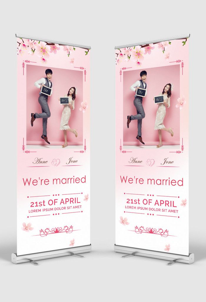 two roll up banners with the words we're married and an image of a man and woman