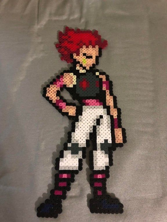 an image of a pixel art character made out of legos on a white sheet