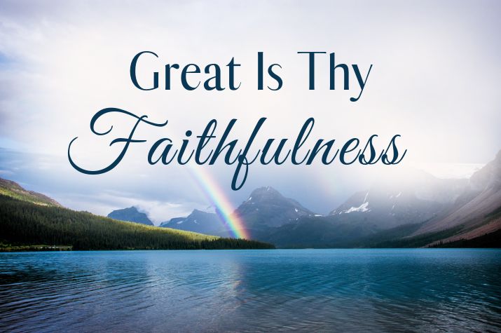 the words great is thy faithlyness over a lake with mountains in the background