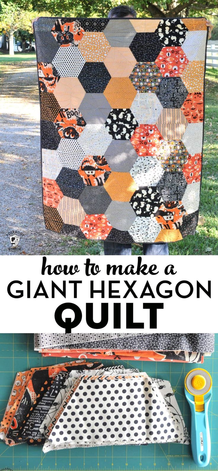 a quilt made with giant hexagons and scissors