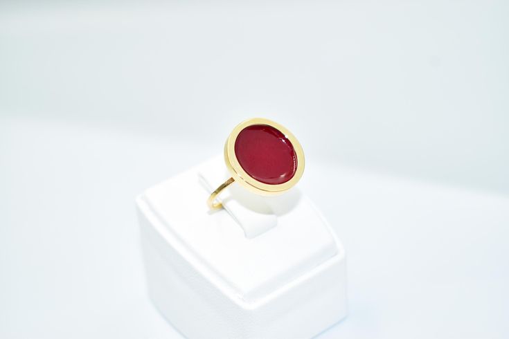 Red Enamel Ring, Bold Statement, Modern Accessory, Vibrant Jewelry, Elegant Ring, Polished Finish, Unique Gift, Fashion Jewelry, Versatile Style Introducing our bold red enamel ring, a perfect fusion of vibrant color and modern elegance. This beautifully crafted piece showcases a striking red enamel finish that adds a pop of color to any look. Designed to make a statement, this ring effortlessly complements both casual and formal attire with its sleek and polished appearance. Key Features: ▪️Vib Elegant Formal Enamel Ring, Modern Red Cabochon Ring, Enamel Cabochon Ring, Red Enamel Elegant Rings, Modern Red Ruby Wedding Ring, Red Oval Enamel Ring For Gift, Modern Red Ruby Ring For Wedding, Oval Red Enamel Ring For Gift, Elegant Red Enamel Ring