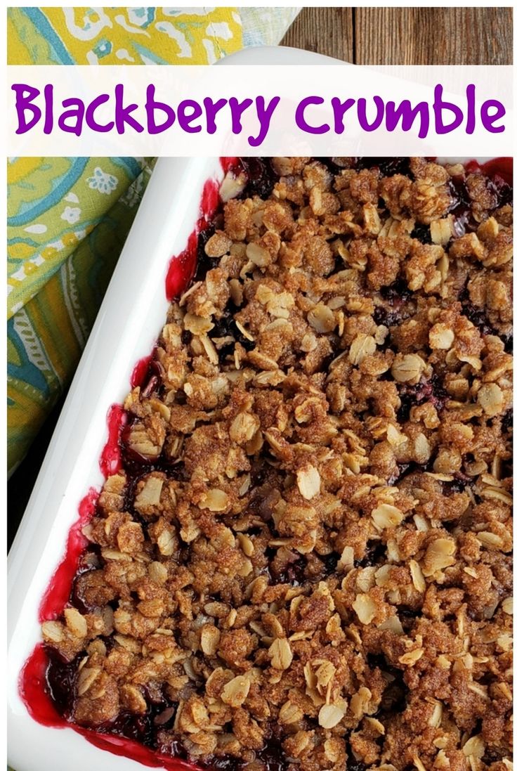 a close up of a plate of food with crumbles