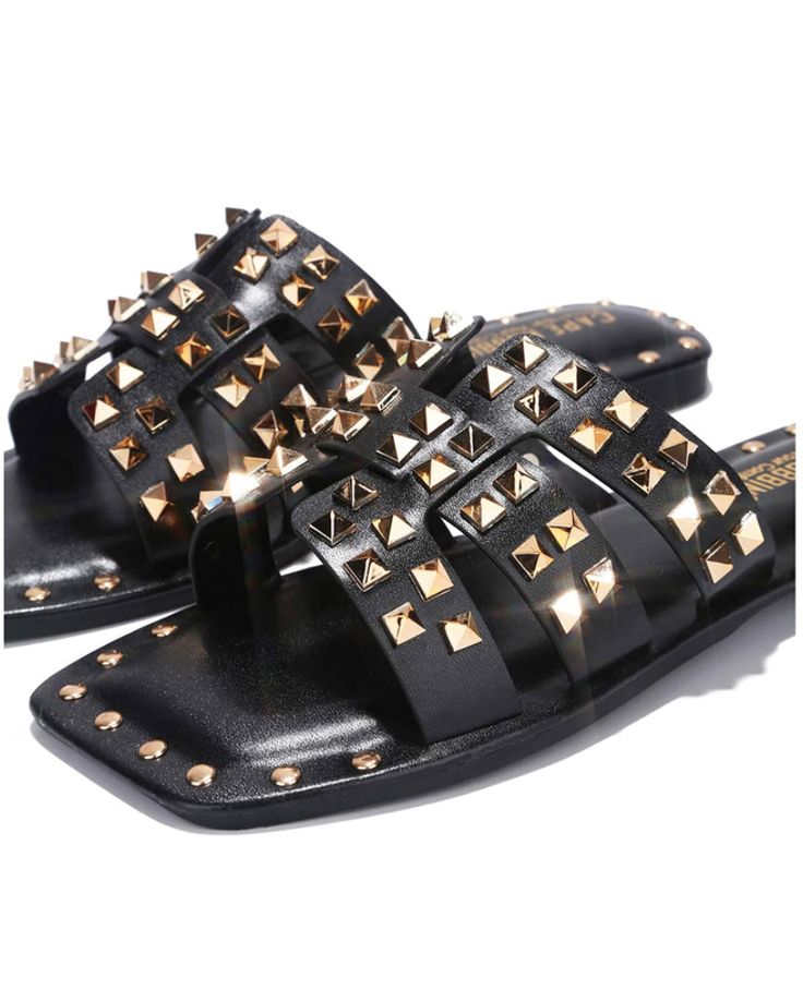 Kharminita Sandal – House Of Fiyah Summer Festival Sandals With Flat Heel, Chic Spiked Sandals For Summer, Trendy Sandals With Buckle Closure For Beach Season, Trendy Buckle Closure Sandals For Beach Season, Black Sandals For Summer Day Out, Summer Party Slide Sandals, Spring Festival Sandals With Buckle Closure, Spring Party Sandals With Spikes, Trendy Spiked Sandals For Spring