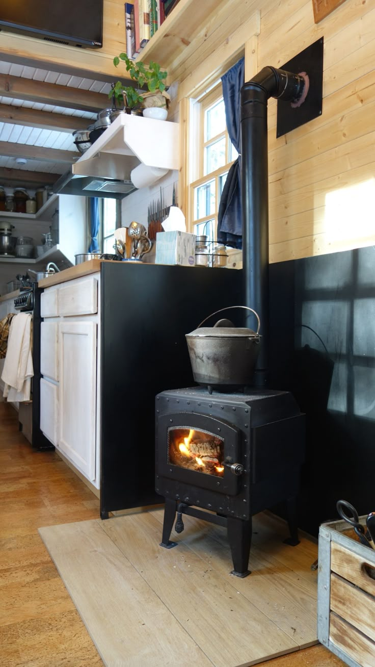 an old fashioned stove in a small kitchen