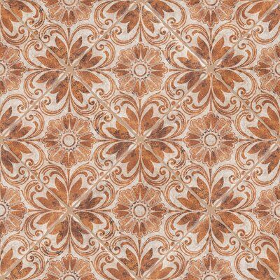 a brown and white tile with an intricate design