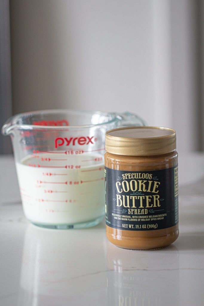 peanut butter and yogurt are sitting on the counter top next to each other