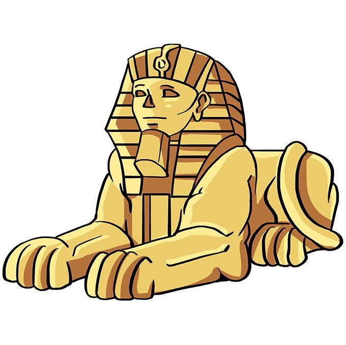 an egyptian statue sitting on the ground