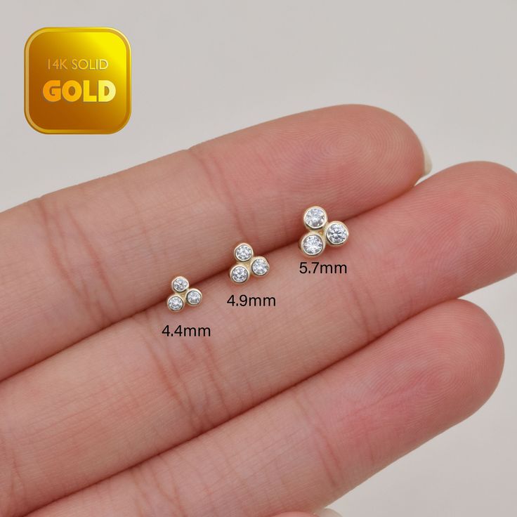 Metal: 14k solid gold, Available Gold color: Yellow gold  Guaranteed Authentic 14k Gold, Not Gold Plated or Gold Filled Stone:  CZ Thickness:0.82mm (20G) Stamp:14k ★Every ear is different, the length of backings that most suitable for your ear will depend on your ear thickness ★Titanium is a very safe metal, so we don't plate it, in order to avoid some people are allergic to the plating material. NOTE The item combined by 14k solid gold and implant grade titanium push in back,  packed in a beautiful Jewelry Box   SHIPPING ADDRESS All the orders will ship to the supplied address through your Etsy Order, Please leave your phone number,will give to carrier for safe deliver. We will not send and replacement parcels due to incomplete or inaccurate address.  PACKING ●Can be Gift packed including 14k White Gold Piercings For Anniversary, Gold Dainty Cubic Zirconia Cartilage Earrings, Dainty Gold Cartilage Earrings With Cubic Zirconia, Anniversary Yellow Gold Plated Cartilage Earrings, Dainty Diamond Gold Piercings, Gold Cubic Zirconia Cartilage Earrings, Gold Cubic Zirconia Fine Jewelry Piercings, Gold Cubic Zirconia Piercings Fine Jewelry, Gold Diamond Nose Ring Gift