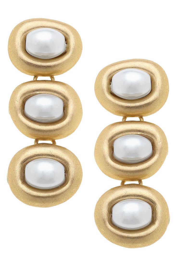 Add a touch of elegance to any outfit with our Willow Pearl Earrings in Worn Gold and Ivory. These stunning earrings feature worn gold tones and delicate ivory pearls, making them the perfect accessory for any occasion. Elevate your style with these timeless earrings that effortlessly combine classic and modern elements. Classic Metal Earrings With Pearl Charm, Chic Gold Clip-on Earrings With Pearl Drop, Elegant Matte Gold Earrings For Party, Elegant Matte Gold Party Earrings, Classic White Pearl Metal Earrings, Elegant Pearl White Metal Pearl Earrings, Chic Gold Clip-on Pearl Earrings, Elegant Gold Metal Pearl Earrings, Gold Clip-on Pearl Earrings