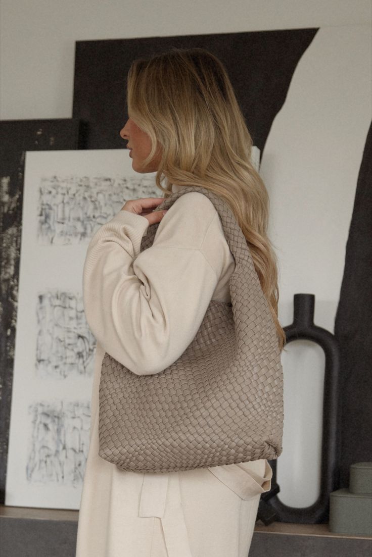 taupe woven vegan leather shoulder bag Beige Woven Leather Bag For On-the-go, Everyday Beige Bag With Intrecciato Weave, Beige Intrecciato Weave Shoulder Bag, Beige Woven Leather Tote Shoulder Bag, Neutral Leather Shoulder Bag With Braided Handles, Beige Hobo Bag With Braided Handles For On-the-go, Neutral Woven Leather Bag For Everyday Use, Chic Taupe Tote Shoulder Bag, Everyday Neutral Woven Leather Bags