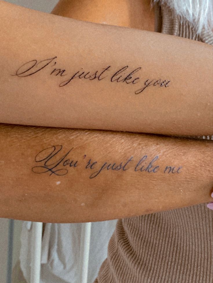 two people with tattoos on their arms that say, i'm just like you