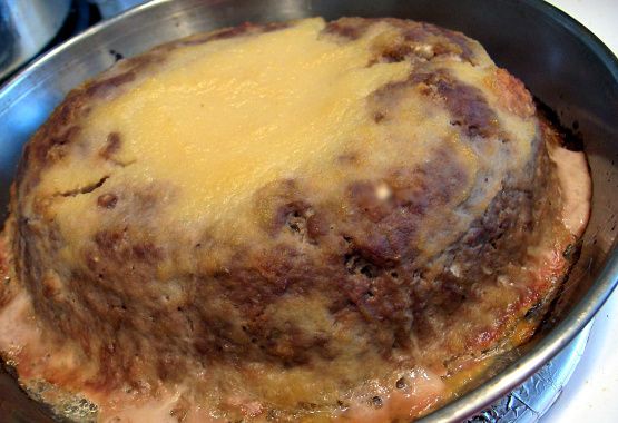 the food is cooked and ready to be eaten in the pan on the stove top