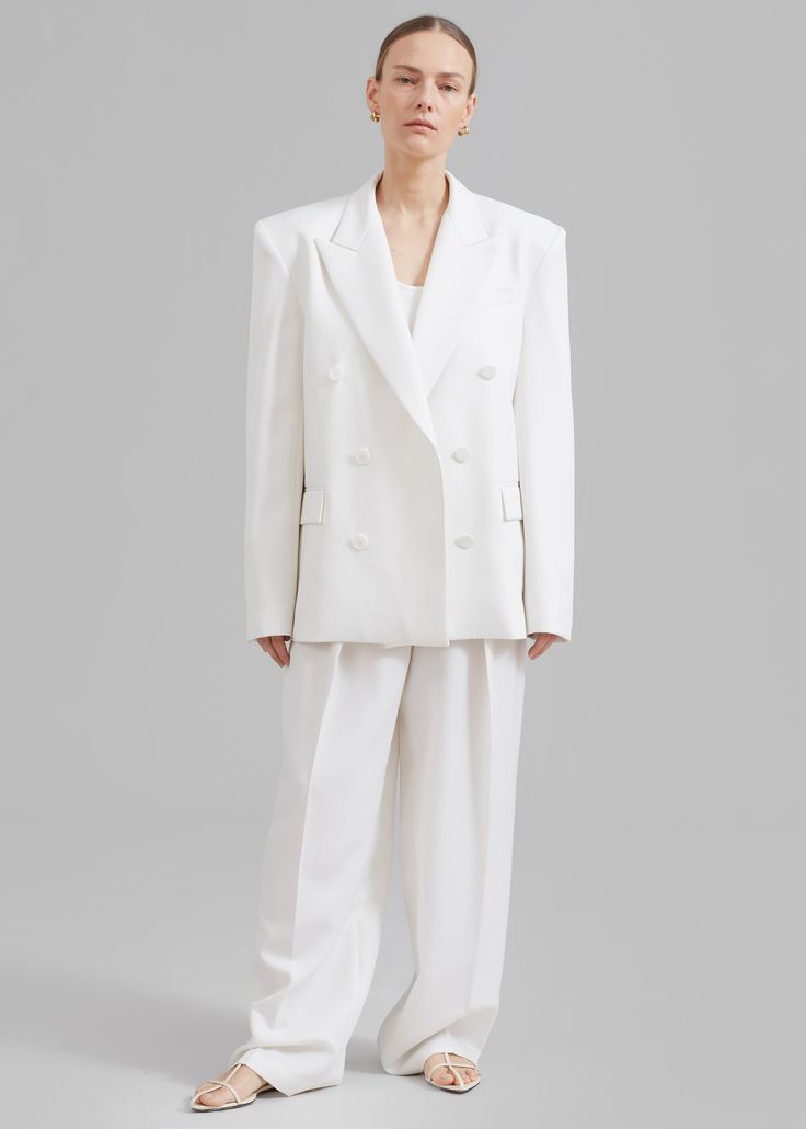 Color: White Lightweight traditional suiting fabric Relaxed fit Straight leg Front pleats Slant hip pockets Back pockets Hook and bar closure Zip fly Unlined 100% Polyester Dry Clean By The Frankie Shop. Imported Frankie Shop Blazer, Denim Suit, The Frankie Shop, Suiting Fabric, Frankie Shop, Paris Woman, White Blazer, Blazer Buttons, Swimwear Accessories