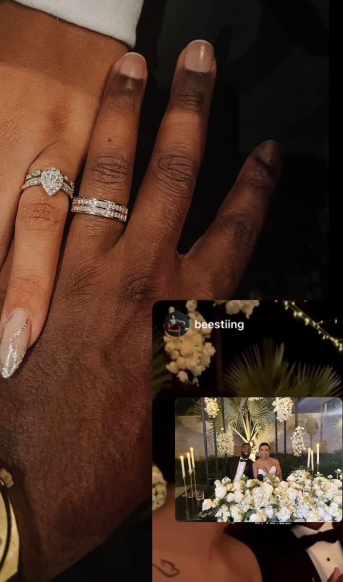 two people with wedding rings on their hands