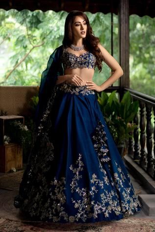 Navy blue lehenga with placement floral motif sequin work and cutwork hem. Comes with embroidered blouse and organza dupatta.
Components:3
Embroidered
Neckline:Sweetheart
Sleeve Length:NA
Fabric:Lehenga and Blouse: Raw Silk; Dupatta: Organza
Color:Blue
Cutwork detail
Tassel tie-up back
Plunging neck
Note: Cancan worn by the model is not for sale - Aza Fashions Lehenga Blue, Royal Blue Lehenga, Navy Blue Lehenga, Lehenga Bridesmaid, Engagement Lehenga, Bridesmaid Lehenga, Raw Silk Lehenga, Lehnga Dress, Anushree Reddy