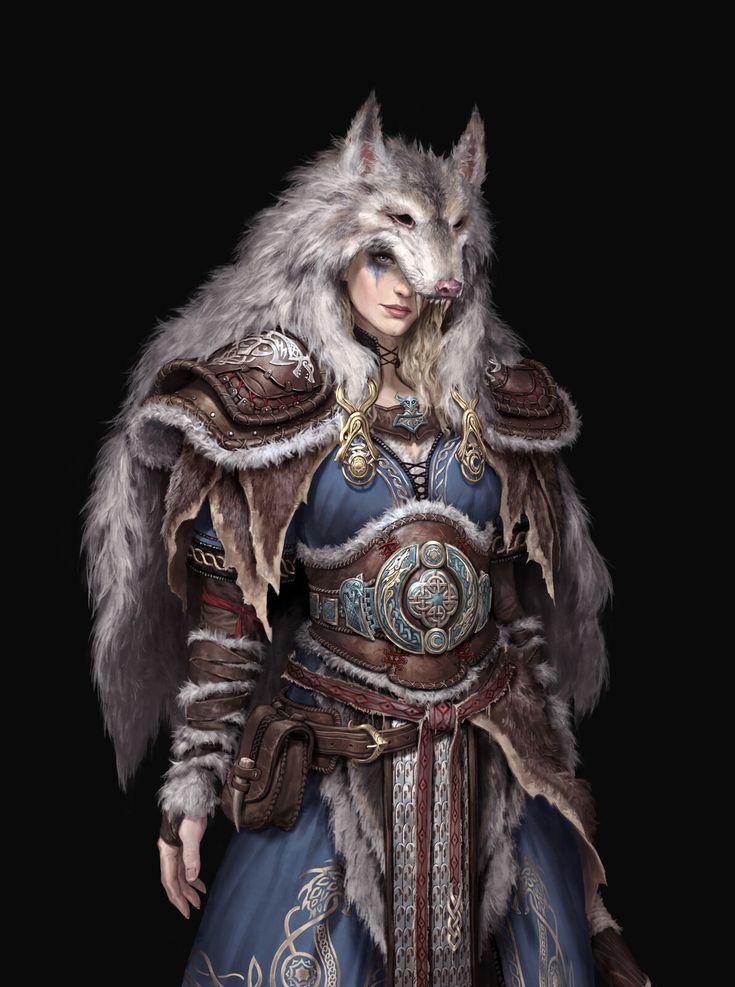 a woman dressed as a wolf with fur on it's head and wearing a blue dress