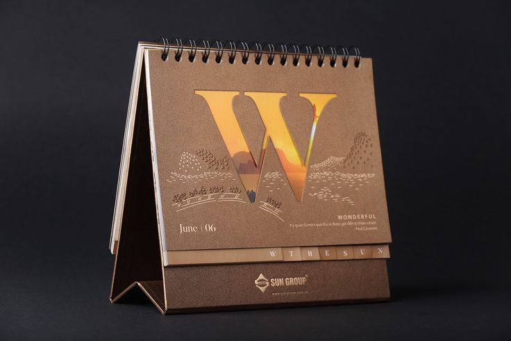 a desk calendar with the letter w on it