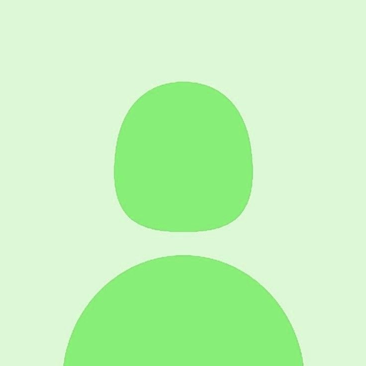 an image of a person's face in green