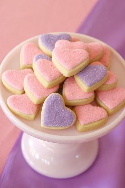 heart shaped sugar cookies on a cake plate