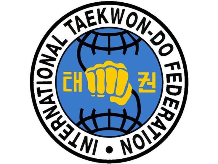 the international taekwon - dof logo is shown in blue and yellow with an image of a fist on it