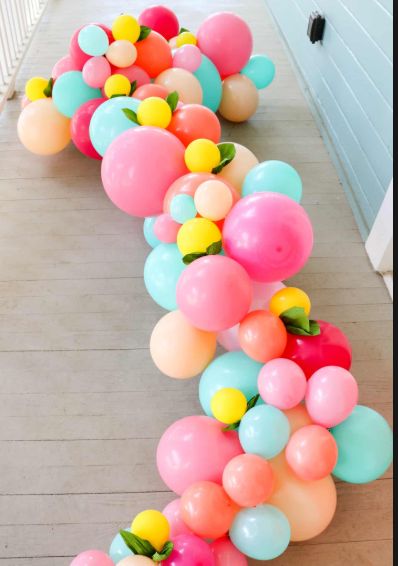 a long line of balloons on the ground