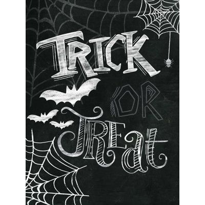 the words trick or treat written on a blackboard with spider web and cobwe