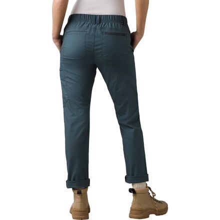 The prAna Double Peak Pant, built with a blend of organic cotton and recycled polyester, features a variety of pocket space, moisture-wicking properties, and an elastic waistband for a secure fit. Functional Cotton Bottoms With Side Pockets, Midweight Versatile Pants With Side Pockets, Functional Cotton Pants With Side Pockets, Versatile Cotton Cargo Pants With Elastic Waistband, Versatile Bottoms With Functional Pockets, Functional Cotton Pants With Tapered Leg, Cotton Pants With Comfort Waistband For Outdoor, Cotton Pants With Hip Pockets For Outdoor Activities, Outdoor Cotton Pants With Hip Pockets