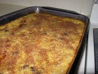 an uncooked casserole sitting on top of a stove