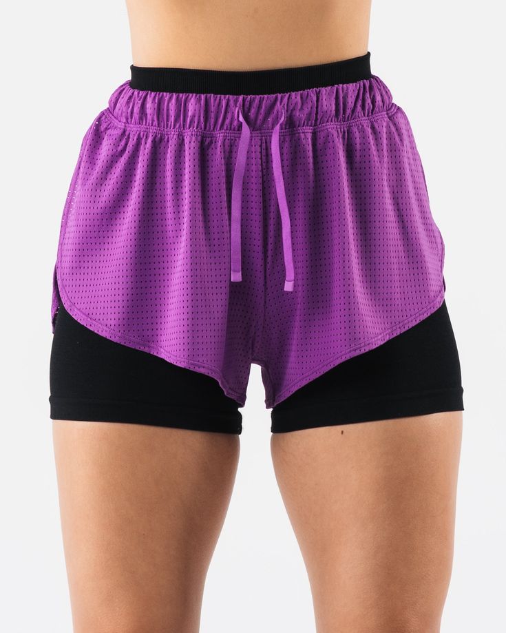 HIGHLIGHTS. 2.5" inseam Adjustable Mid rise Breathable mesh Layering FIT SUGGESTION. This item runs true to Alphalete's relaxed fit... Laura is 5’6”/168cm, wearing a size XS. with 23"/58.4cm waist and 36"/91.4cm hips. MATERIALS AND WASHING DIRECTIONS. 65% Nylon, 35% Spandex. We recommend washing inside-out on a cold setting. Hang to dry DESCRIPTION This light weight mesh makes for the perfect summer layering piece. Wear it over any of your favorite Alphalete bottoms for a stylish layer that will help keep you cool in the summer heat. | Alphalete Women's Margo Mesh Short | Blaze | 2XL | Nylon/Spandex Sports Mesh Bottoms With Mesh Back, Sport Bottoms With Mesh Back, Moisture-wicking Mesh Yoga Bottoms, Functional Mesh Workout Bottoms, Breathable Stretch Athletic Shorts For Workout, Breathable Mesh Stretch Athletic Shorts For Workout, Purple Nylon Workout Bottoms, Functional Running Bottoms With Mesh Back, Mesh Sportswear Bottoms For Running