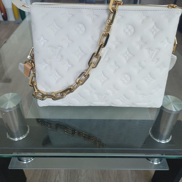 Purse, White, Like New, Comes With Black Lv Wallet. Never Used Or Out In Public. Have All Reciepts From Lv Store. Luxury White Clutch With Chain Strap, Luxury White Clutch With Gold-tone Hardware, Luxury Clutch With Chain Strap For Shopping, Luxury White Clutch With Detachable Strap, Luxury White Shoulder Bag Clutch, Designer White Shoulder Bag Clutch, Lv Store, Lv Shoulder Bag, Louis Vuitton Tivoli