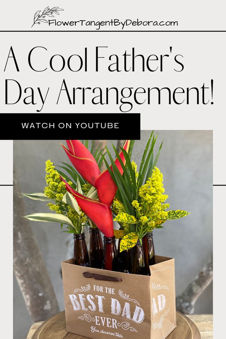 a father's day arrangement with beer bottles and flowers in a brown paper bag