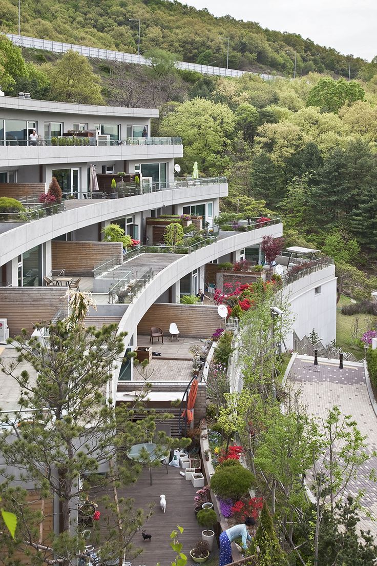 an aerial view of a building with many balconies