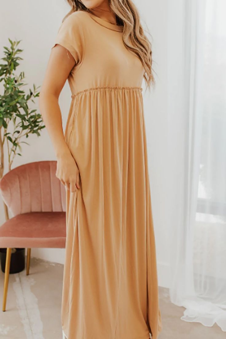 Round Neck Short Sleeve Flowy Maxi Dress Flowy Beige Solid Color Dress, Casual Beige Solid Color Dress, Casual Stretch Brown Maxi Dress, Casual Brown Stretch Maxi Dress, Casual Stretch Beige Midi Dress, Casual Stretch Maxi Dress For Brunch, Casual Brown Maxi Dress For Daywear, Casual Brown Maxi Dress For Brunch, Silhouette Maternity