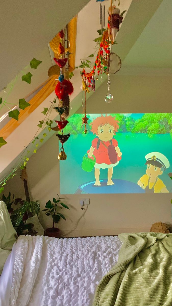 Projector ponyo studio ghibli home cinema bedroom ideas plants room tour howls moving castle sun catcher Ponyo Room Aesthetic, Room Inspo Ghibli, Ponyo Themed Bedroom, Ponyo Room, Studio Ghibli Themed Room, Ghibli Inspired Room, Ghibli Office, Studio Ghibli Room Decor, Studio Ghibli Room Aesthetic