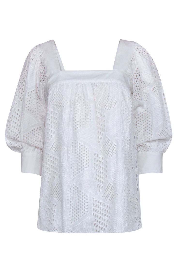 Look simply sweet in this darling blouse from Milly. Crafted from 100% crisp white cotton, this charming top features embroidered eyelet designs in a playful geometric pattern. Style this feminine gem with blue jeans and a brown woven slide for an effortless weekend look! Shell 100% Cotton Combo 75% Cotton, 20% Polyamide, 5% Elastane Lining 100% Cotton Made in USA Square neckline Button keyhole at neck Buttoned cuffs 3/4 length sleeves Bust 33" Waist 42" Shoulder to hem 26" Sleeve length 19.5" Eyelet Sweater, Buy Shoes Online, White Eyelet, Cotton Blouse, Square Necklines, Luxury Shop, Cotton Blouses, Contemporary Fashion, Creative Fashion