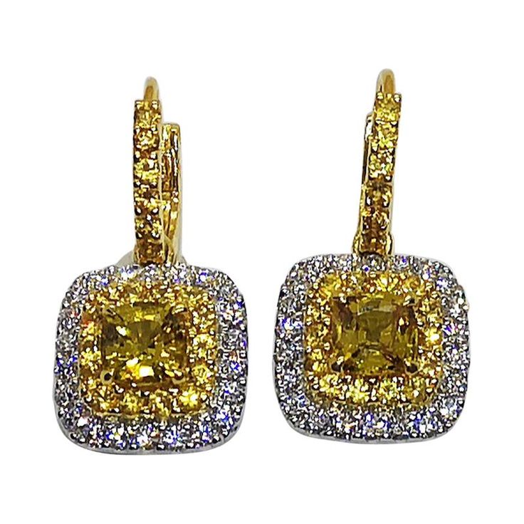 Yellow Sapphire 2.31 carats with Yellow Sapphire 1.14 carats and Diamond 1.04 carats Earrings set in 18 Karat White Gold Settings Width: 1.5 cm Length: 2.5 cm "Since we first opened doors in 1980 our store was then situated in the vicinity of the Victory Monument; a small and modest storefront with a couple of counters. From our humble beginnings to where we stand today, we has proven our abilities as a jeweler. From the 80s up til today, we have been supplying fine quality pieces to dealers, wh Canary Diamond, Butterfly Shoes, Sabyasachi Jewellery, Sapphire And Diamond Earrings, Women Diamond, Yellow Sapphire, Sapphire Diamond, Girls Best Friend, Earrings Set