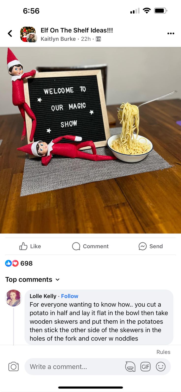 an elf is sitting on top of a table