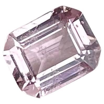 a pink diamond is shown on a white background