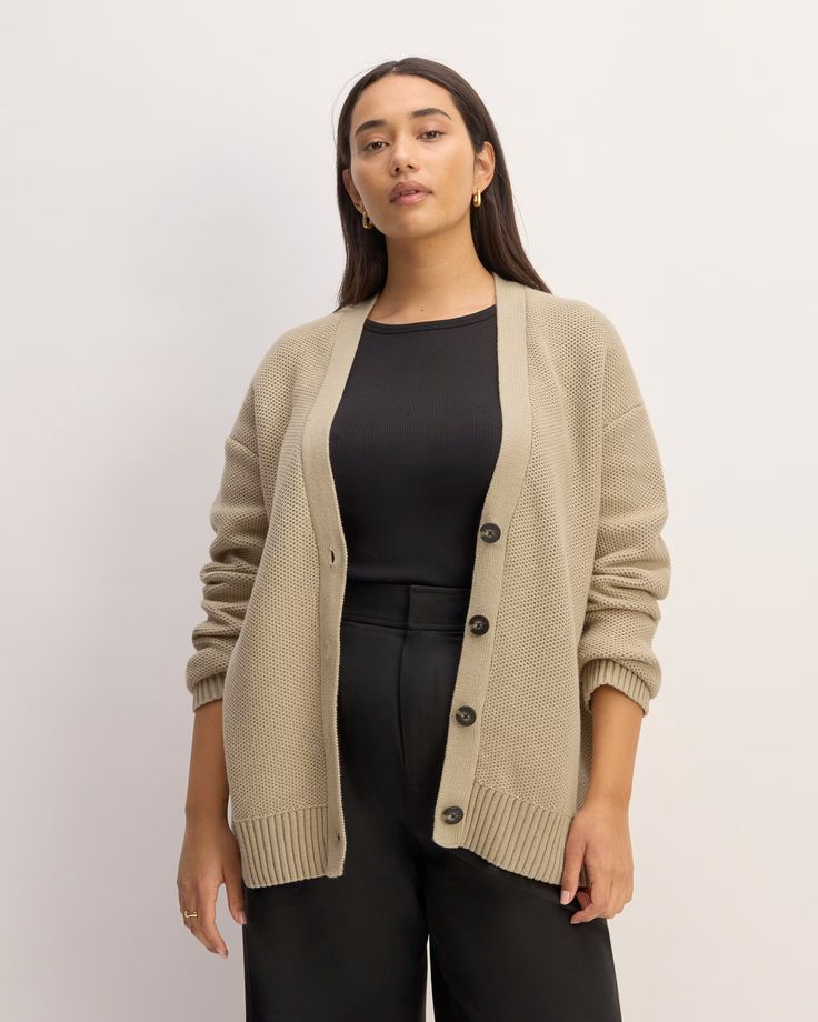 Meet the Cotton Honeycomb Cardigan. This piece features an  easy relaxed fit, long sleeves, V-neck, button-front closure, and drop shoulders with a  thick rib-stitched hem and neckline in 100% organic cotton. Oversized Everyday Button-up Sweater, Oversized Button-up Sweater For Everyday, Classic Oversized V-neck Sweater, Everyday Oversized Button-up Cardigan, Oversized Cardigan With Button Closure For Everyday, Classic Relaxed Fit V-neck Sweater For Fall, Cotton Cardigan With Button Closure In Relaxed Fit, Cotton Button-up Cardigan For Daywear, Classic Cotton Cardigan For Everyday