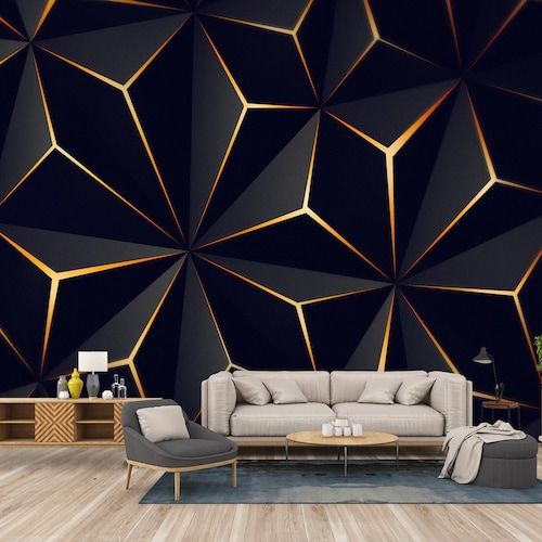 a modern living room with black and gold wallpaper