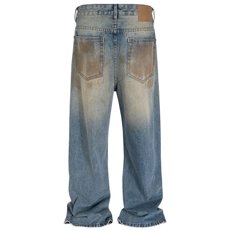 Wide-leg jeans with a sun-bleached effect. Features a gradient wash from blue to sandy tones, with strategically placed knee rips. The worn-in look and frayed hems add vintage appeal. Combines a relaxed silhouette with rugged detailing for an authentic, lived-in style. Faded Washed Cutoff Jeans, Urban Denim Blue Distressed Flare Jeans, Urban Style Distressed Denim Blue Flare Jeans, Urban Distressed Denim Blue Flare Jeans, Faded Distressed Denim Flare Jeans, Acid Wash Denim Cutoff Jeans, Washed Blue Jeans With Frayed Hem For Streetwear, Distressed Medium Wash Flare Jeans For Streetwear, Acid Wash Distressed Cutoff Jeans